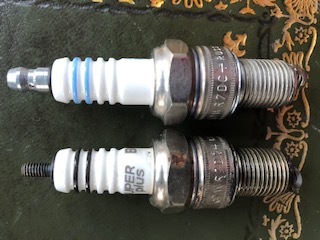Old and new spark plugs